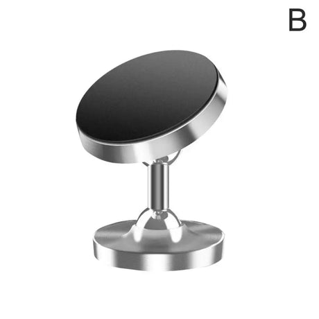 a round metal table top with a black surface