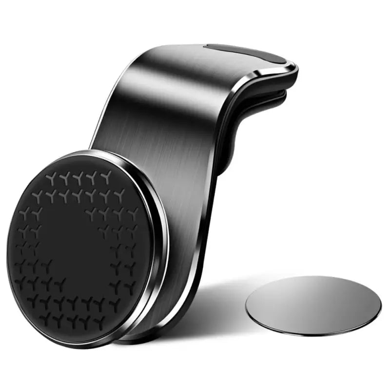 a black and silver phone stand with a circular base