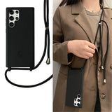 Black smartphone case with an attached crossbody lanyard.