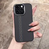 Black smartphone case with a carbon fiber texture and two vertical gray stripes.