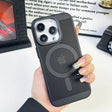 Black smartphone case with a circular speaker pattern and triple camera cutout.