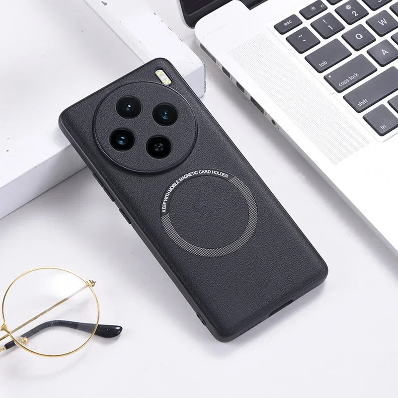 Black smartphone case with a circular magnetic attachment and a quad-camera array.