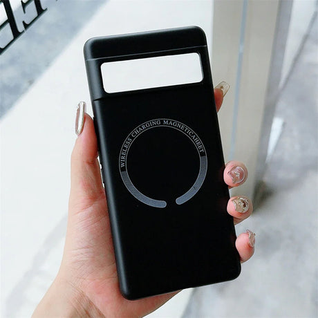 Black smartphone case with a circular design element on the back.