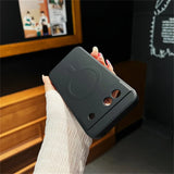 Black smartphone case with a circular design and camera cutouts.