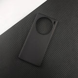 Black smartphone case with a circular cutout for the camera.