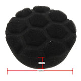 a black sponge with a white background
