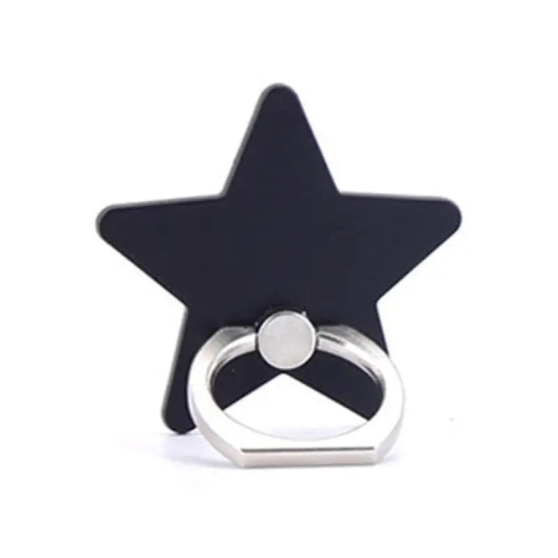 a black star shaped ring with a silver ring on top