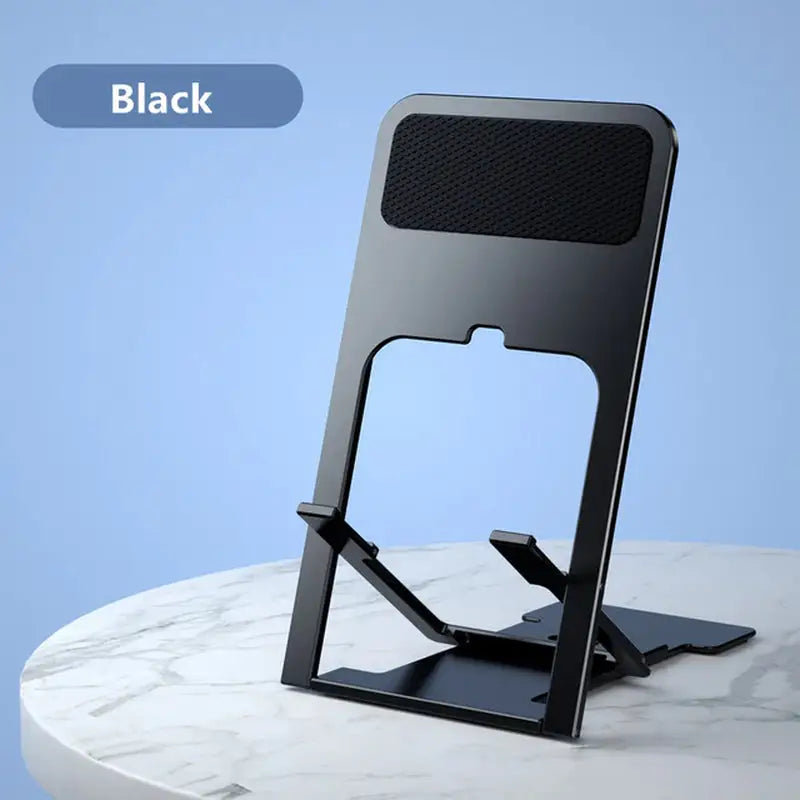 a black phone stand on a marble table