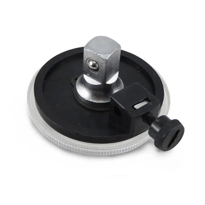 a black and white metal knob with a screw