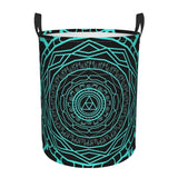 a black and turquoise colored trash bag with a circular design