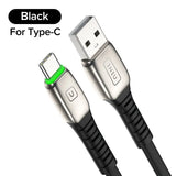 a usb cable with a green light on top
