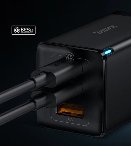 Black USB charger adapter with multiple ports and a blue LED indicator light.