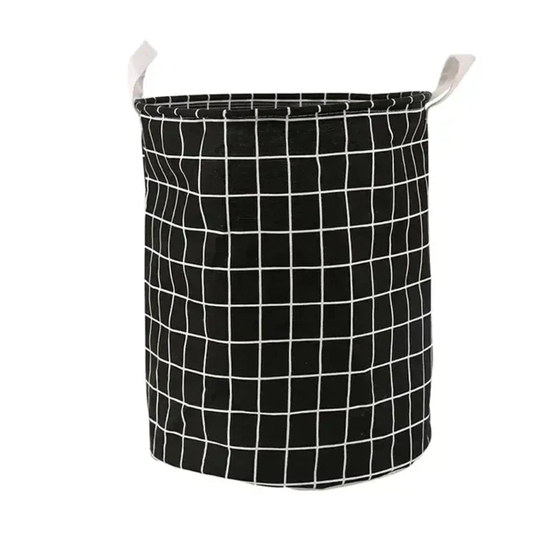 a black and white basket with a grid pattern