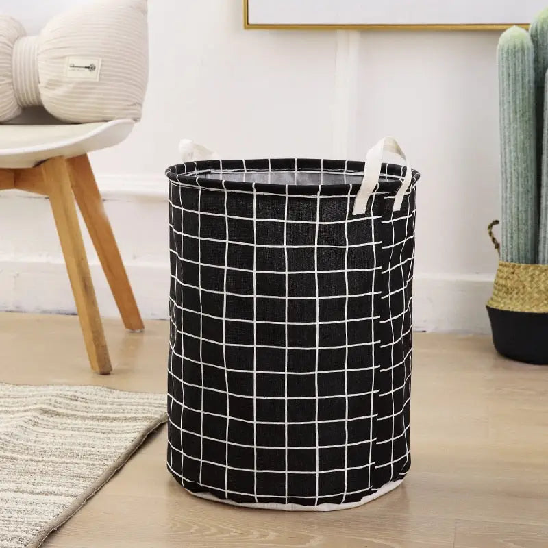 a black and white basket with a white grid pattern