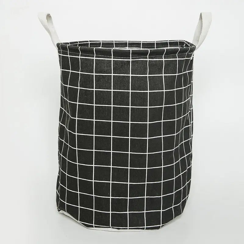 a black and white basket with a white grid pattern