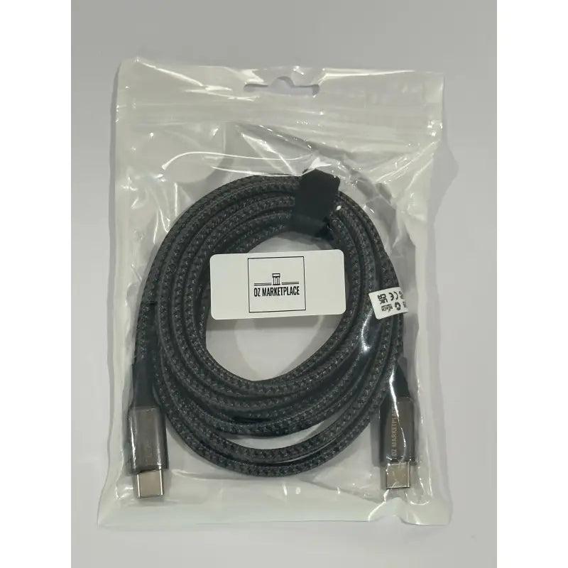 A black and white cable with a white label