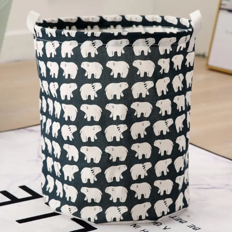 a black and white elephant print storage bag