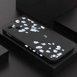 a black and white floral phone case