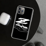 a black and white iphone case with a car on it
