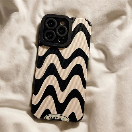 A black and white iphone case with a black and white che pattern