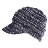 a black and white hat with a knitted bre