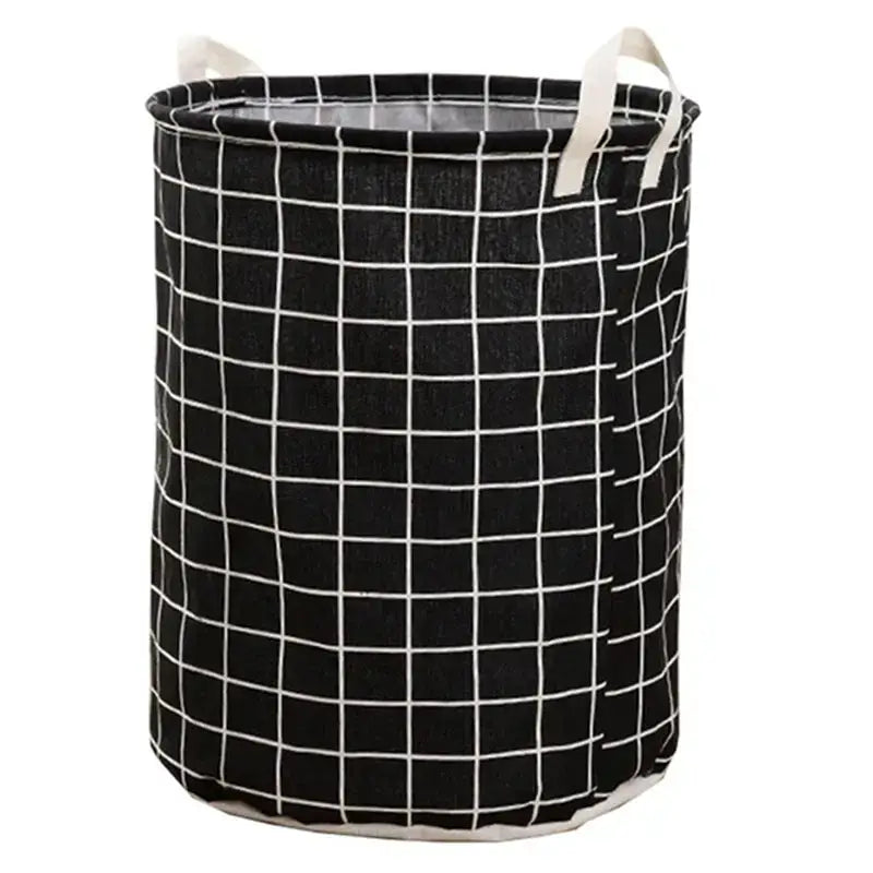 a black and white laundry basket with a white handle