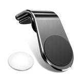 a black and white phone holder with a white button