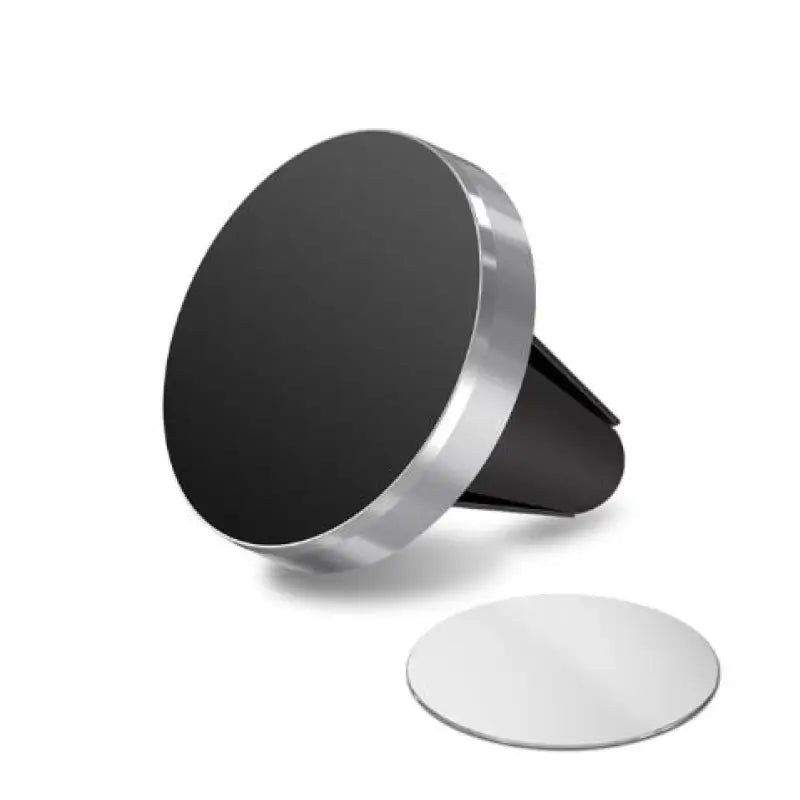 a black and white phone stand with a circular base