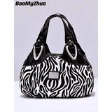 a black and white zebra print bag