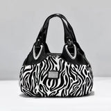 the black and white zebra print bag