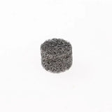 a pile of black metal wire on a white background