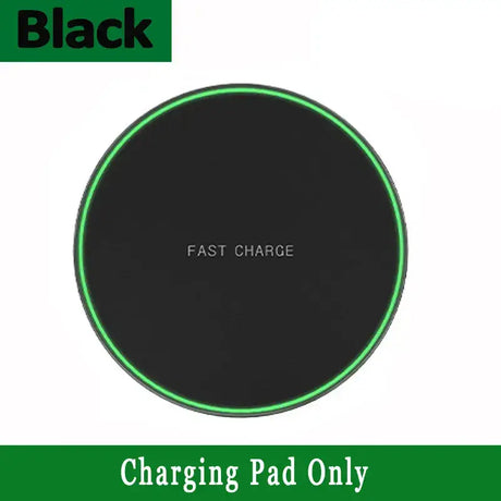 A black wireless charger with a green glow on it