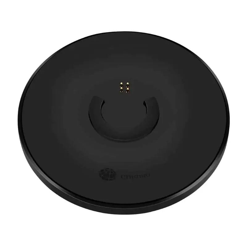 a black wireless charging dock with a smile on it
