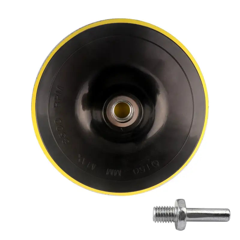 a black and yellow wheel with a screw