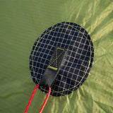 a black and yellow kite with a red string attached to it