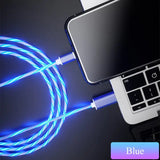 a close up of a laptop with a blue lightning cable connected to it