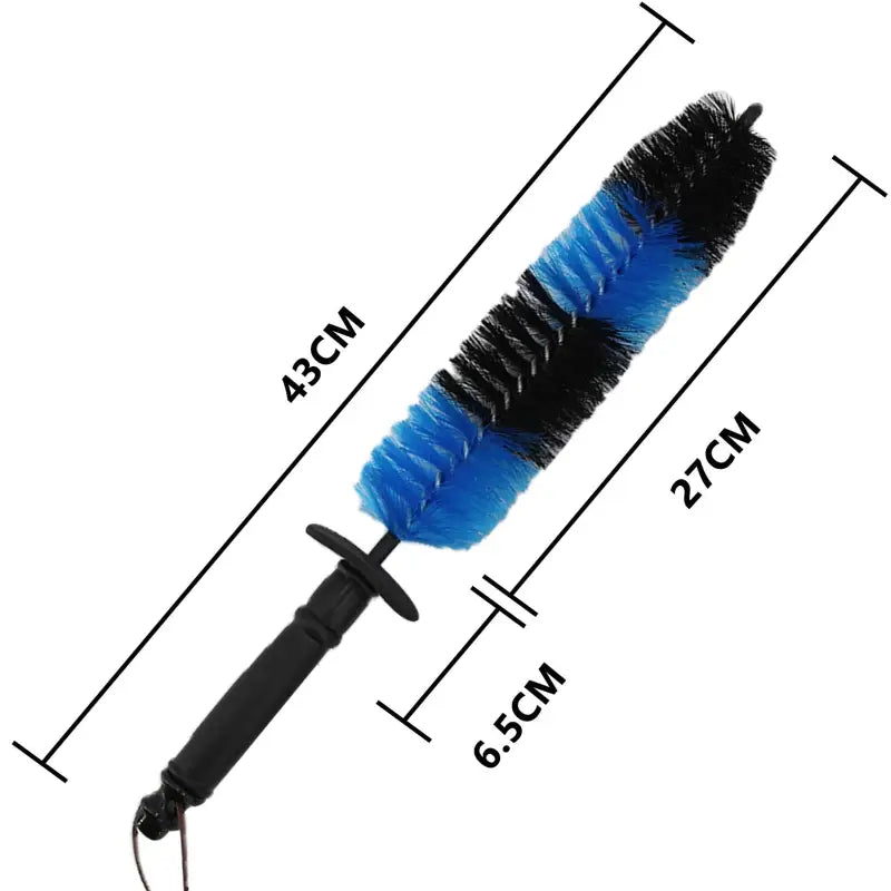 a blue and black brush with a black handle