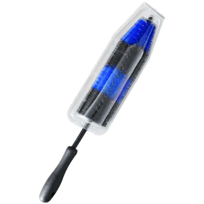 a blue and black brush with a black handle