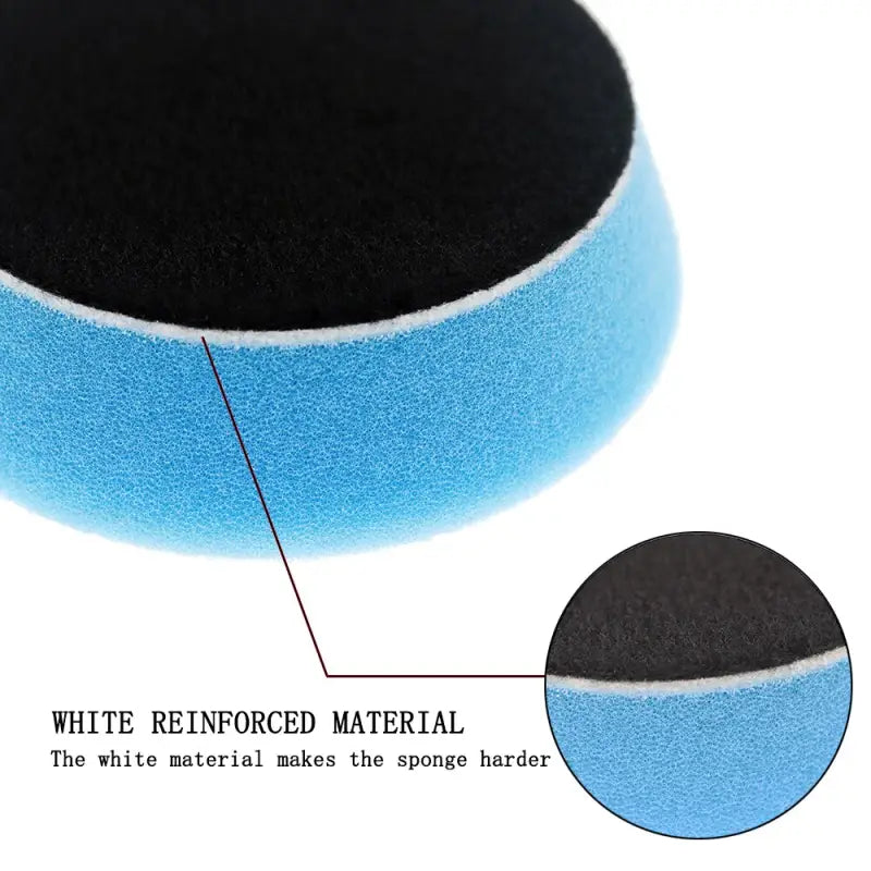 a blue and black sponge sponge with a white border