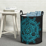 a black and blue laundry basket with a design of a circular design