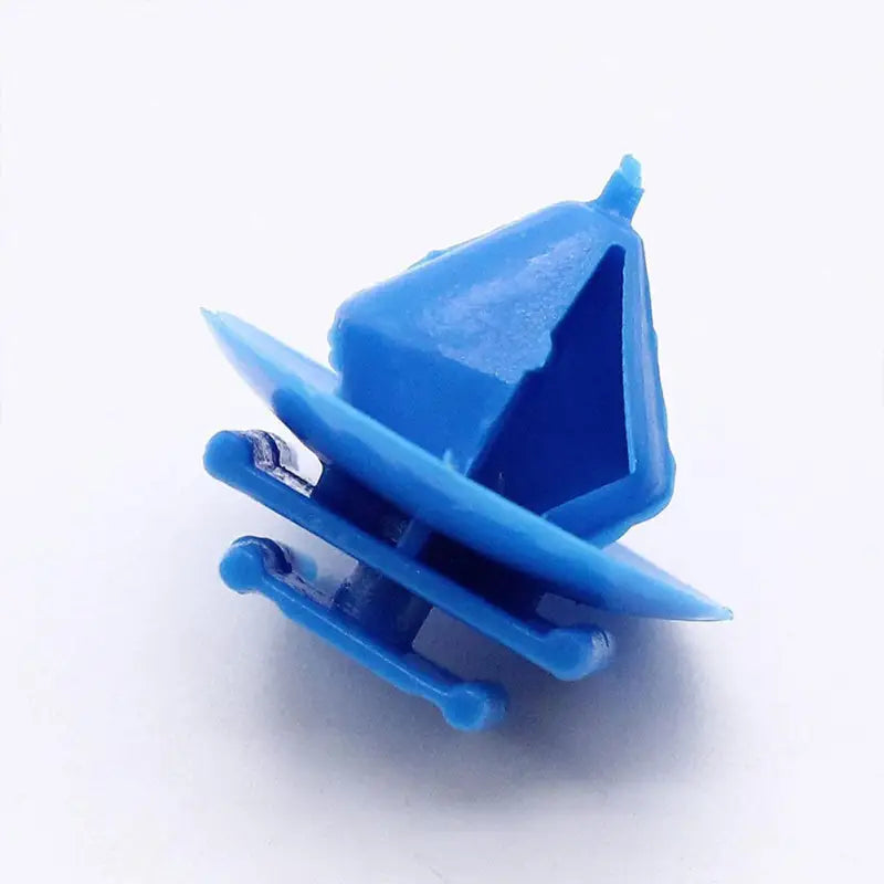 a blue plastic boat with a small sail on it