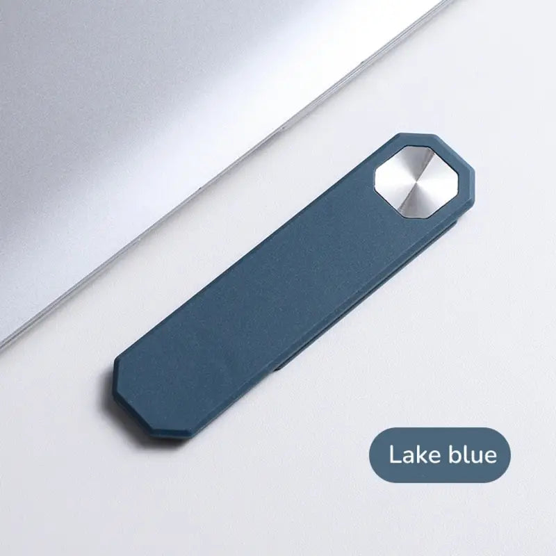 a blue bottle opener on a white surface