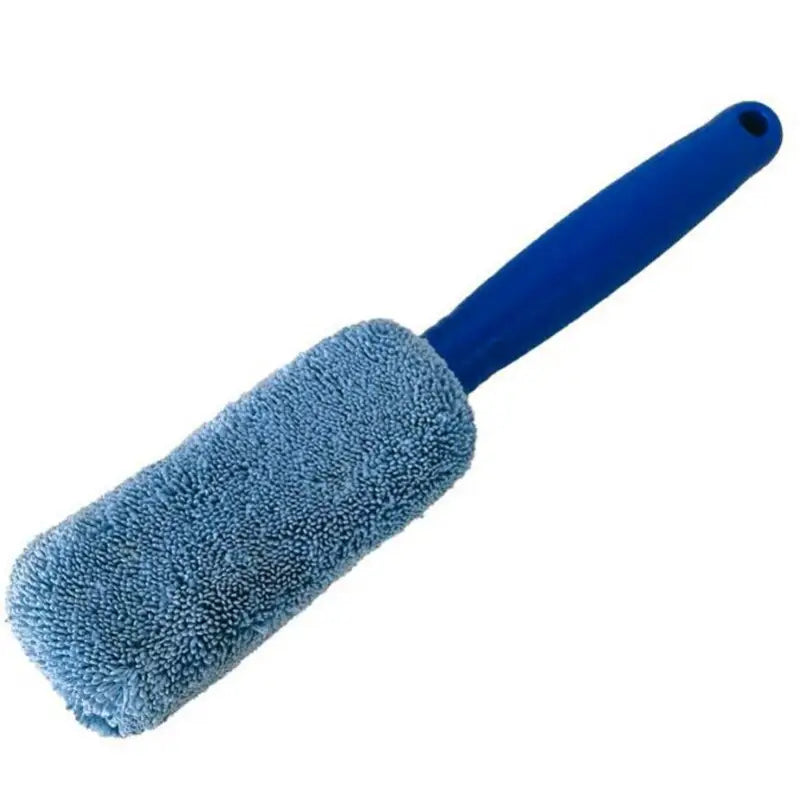 a blue brush with a blue handle