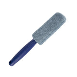 a blue brush with a handle