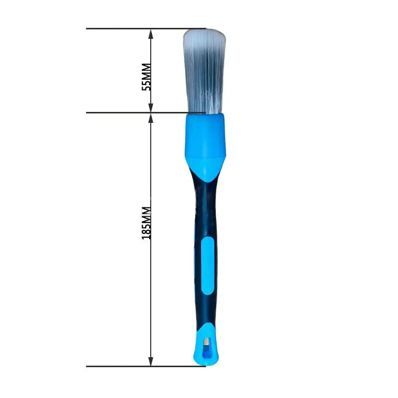 a blue paint brush with a white handle