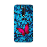 a blue butterfly printed on a red and black background