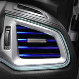 the interior of a car with blue leds