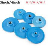 six blue plastic discs with holes on them on a white surface