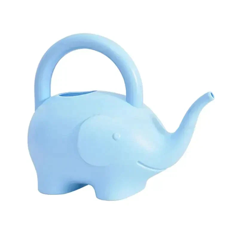 a blue elephant shaped teapot