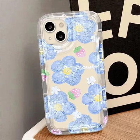 a phone case with blue flowers on it